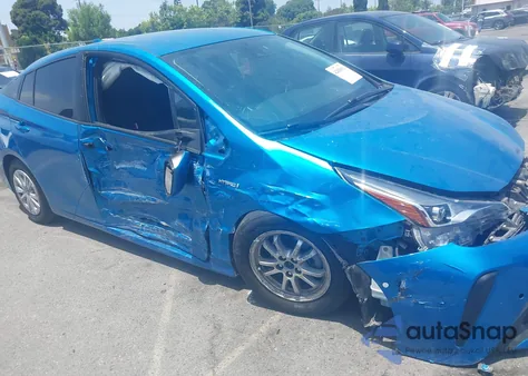 2021 Toyota Prius Le from USA, damaged, VIN JTDKAMFUXM3134462